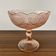 Coupe à fruits en verre rose