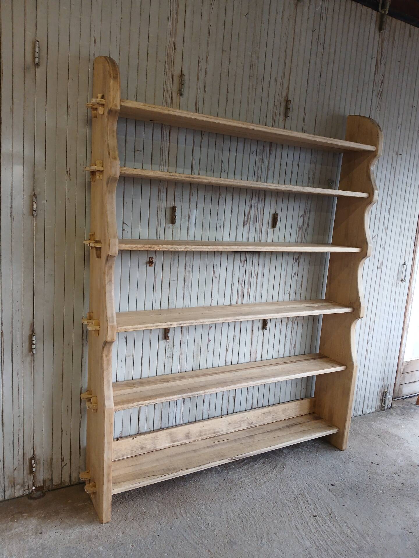 Solid wood shelf in brutalist style