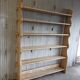 Solid wood shelf in brutalist style