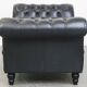 Black chesterfield daybed made of cowhide