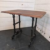 Bistro table with cast iron legs and oak top