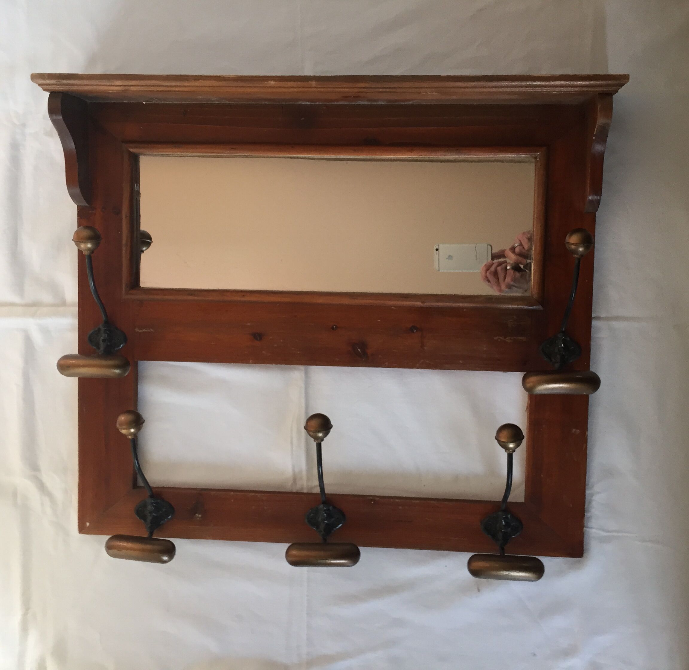 Old wood and brass coat rack