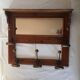 Old wood and brass coat rack