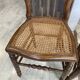 Pair of N2 antique caned and wooden chairs from the 1900s.