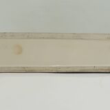 Beige and brown ceramic representing a “Greyhound/vintage 1930