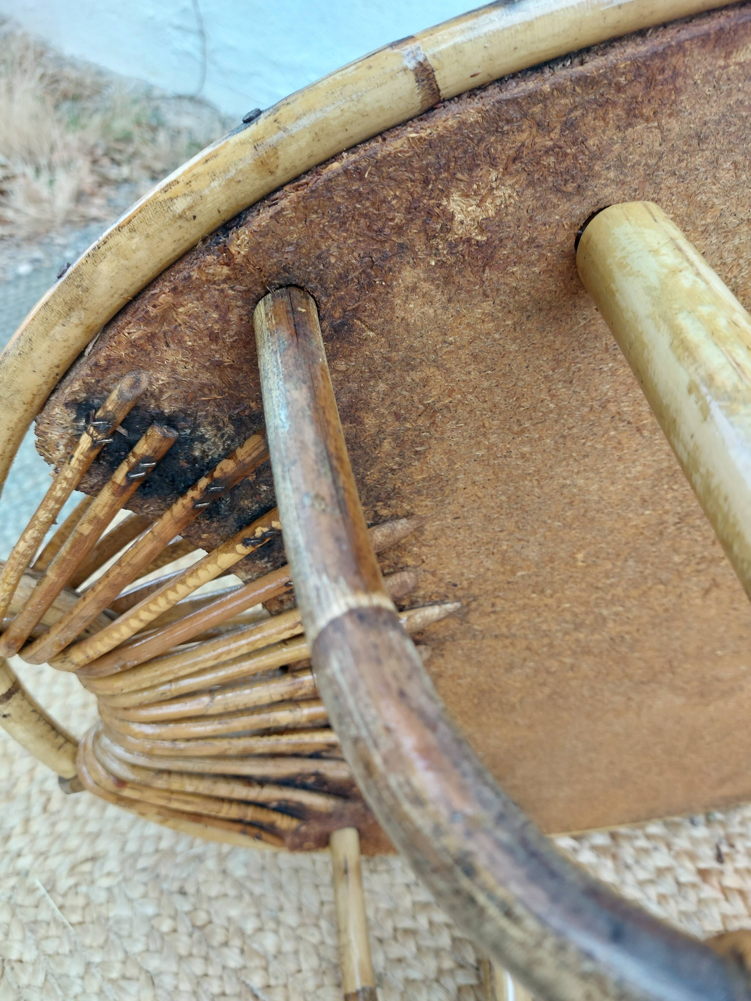 4 armchairs and a coffee table made of rattan and bamboo wood, vintage.