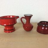 3 red ceramic vases