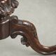 Round antique side table / wine table with rich carvings