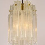 Pendant light with hand-blown glass pieces on a brass base made by Glashütte Limburg.