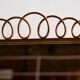 Metal and brass framed mirror