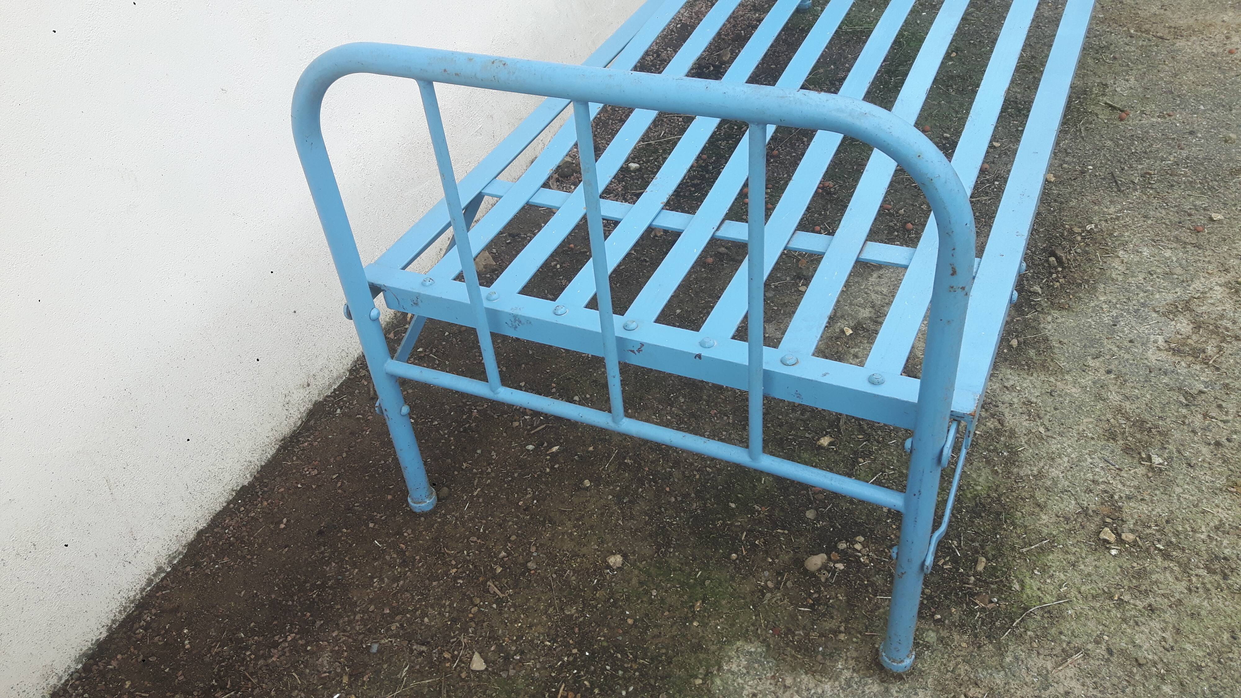 Blue iron bed.