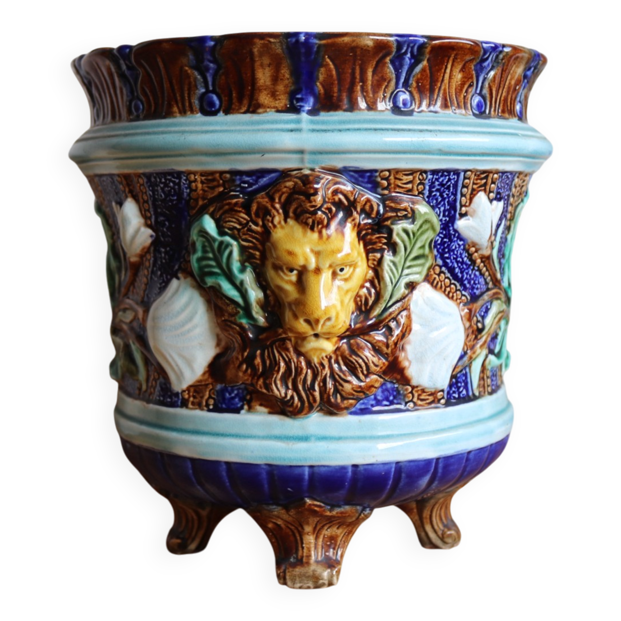 Cache-pot ancien en barbotine à décor de lions