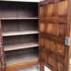 Spanish furniture with carved wood profiles and coats of arms from the 1950s.