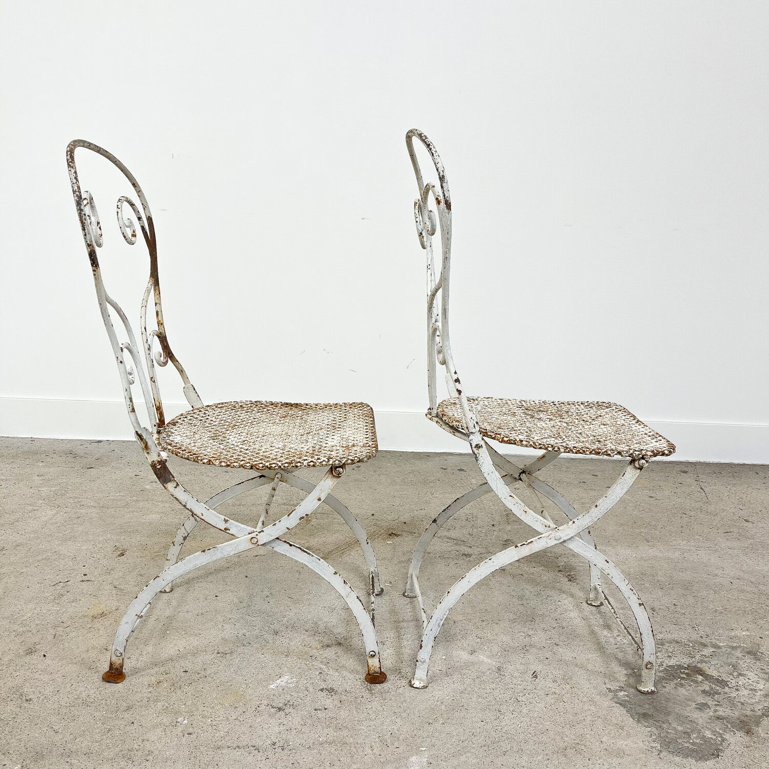 Set of two vintage foldable metal bistro chairs by Mathieu matego