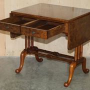 Antique extendable coffee table circa 1880 in solid walnut.