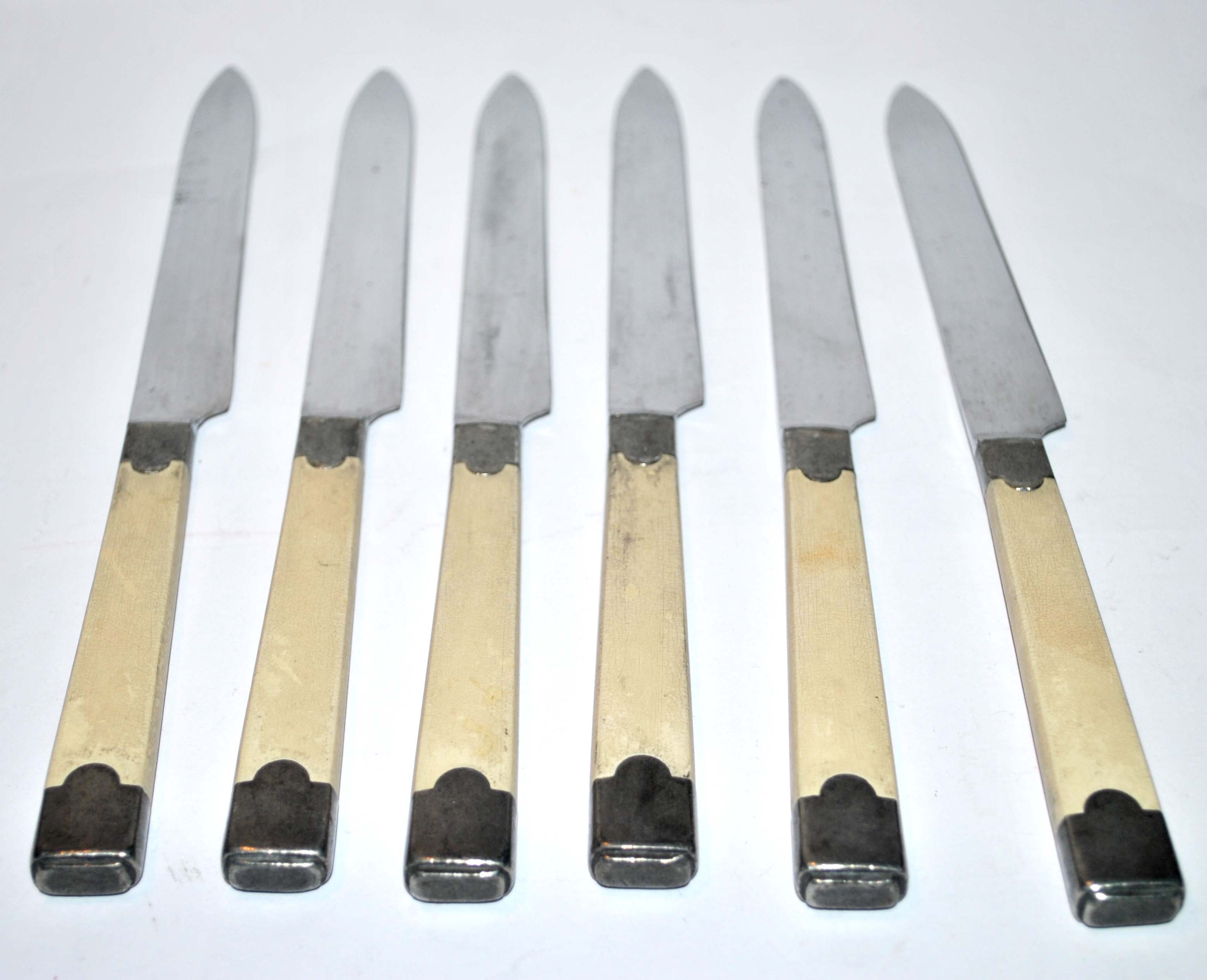 Series of 6 retro table knives in steel and ivory cracked lacquer 1940