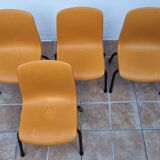 Set of 4 vintage Grosfillex school chairs, 60s-70s, orange plastic and tubular base