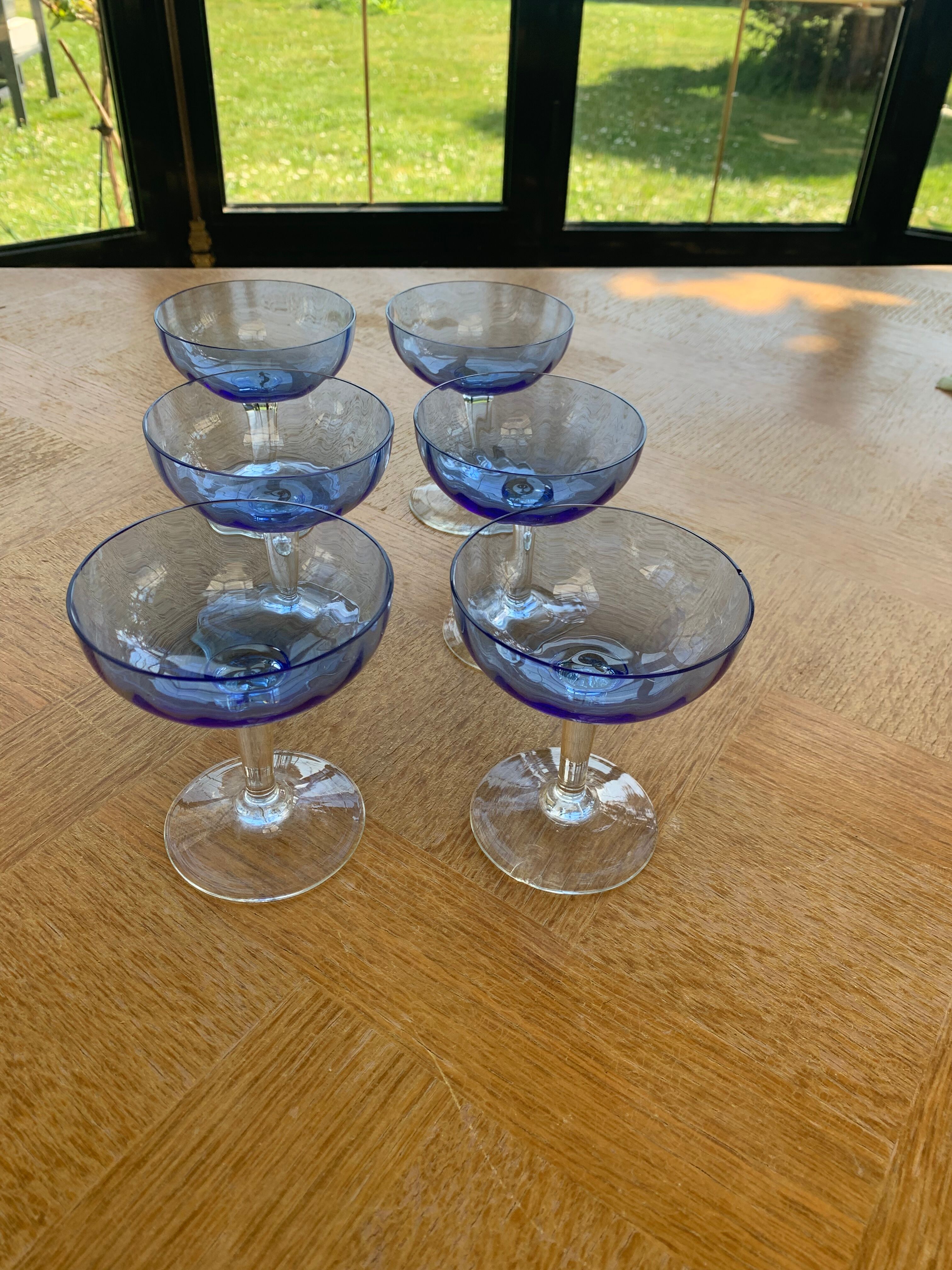 6 champagne glasses in blue glass and vintage transparent base