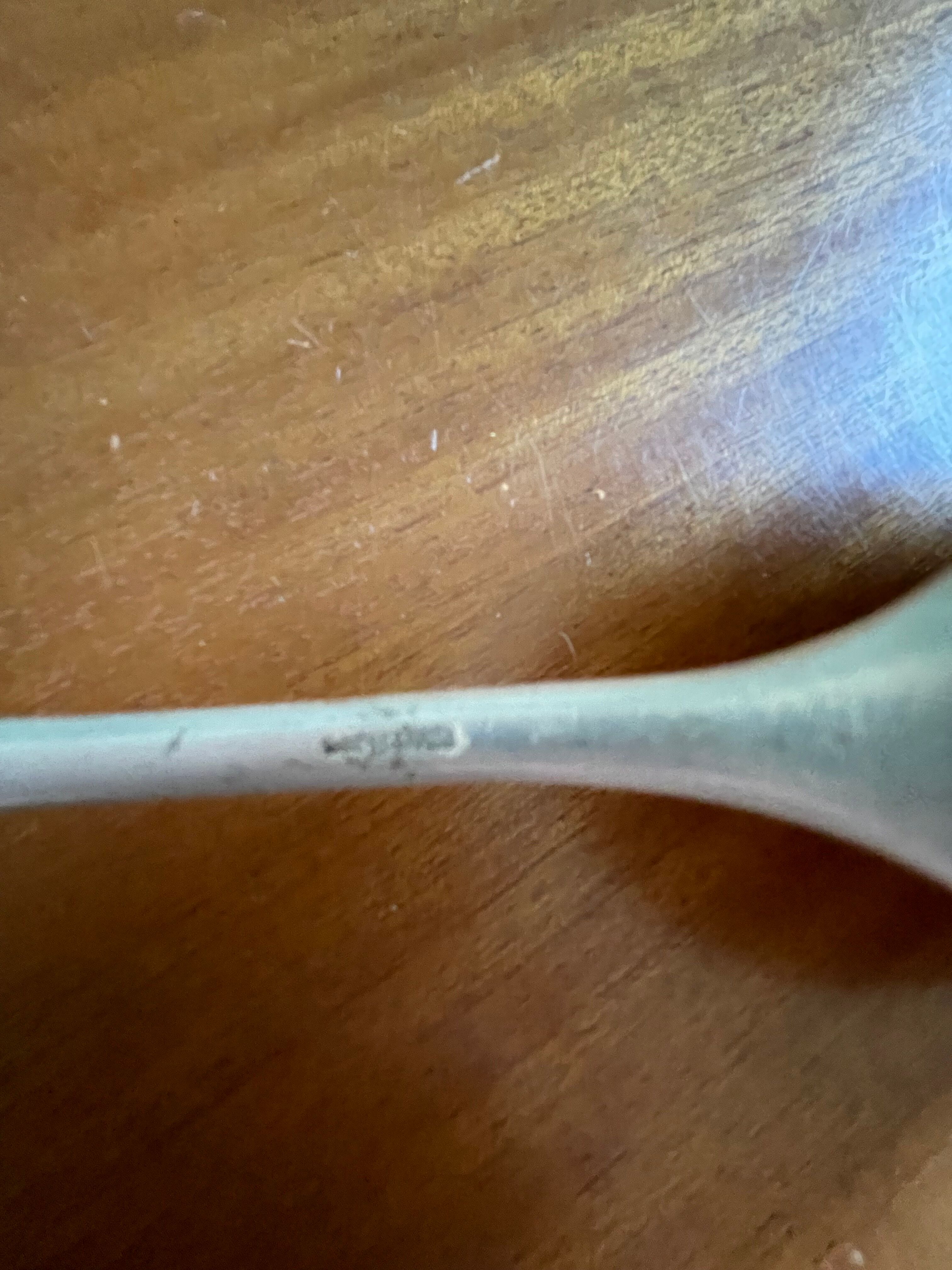 Silver metal ladle