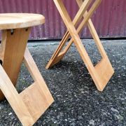 Lot table and folding stools Suzy by Adrian Reed.