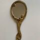 Art Nouveau brass mirror for women