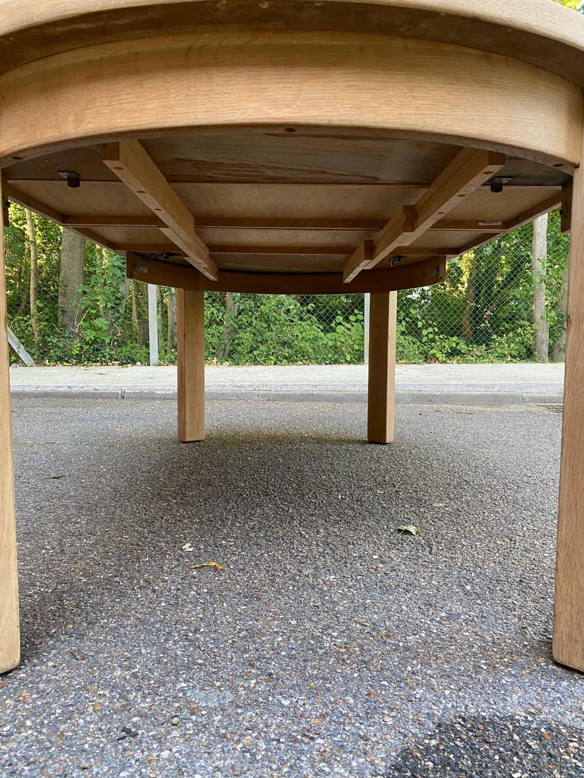 Table à manger scandinave ronde extensible décapée en chêne brut 1980