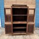 Art Deco glass-fronted cabinet in Burmese teak with original patina.
