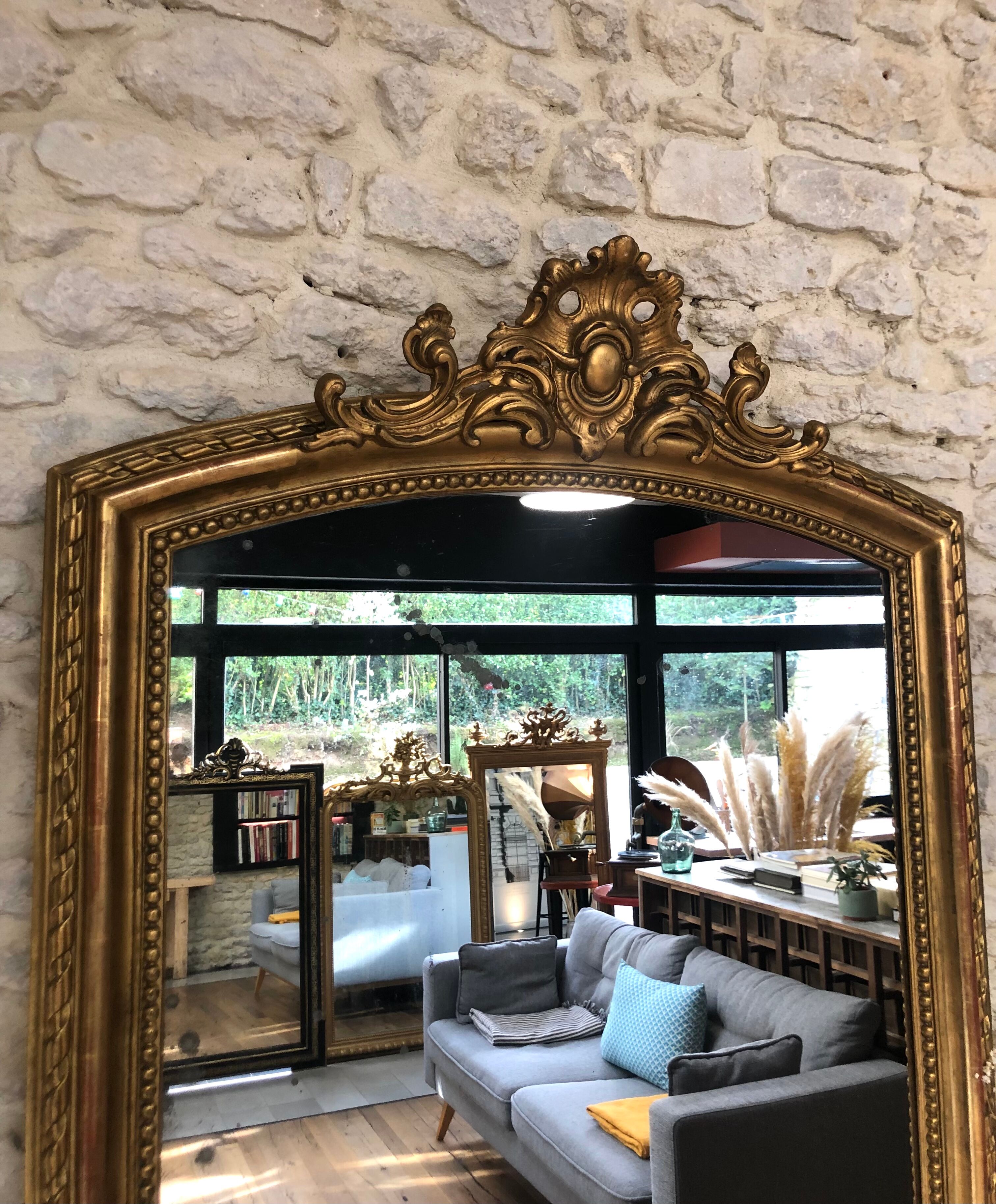 Old mirror 139cm/ 91cm Louis-Philippe with pediment period early 19th, presence of gold leaf.