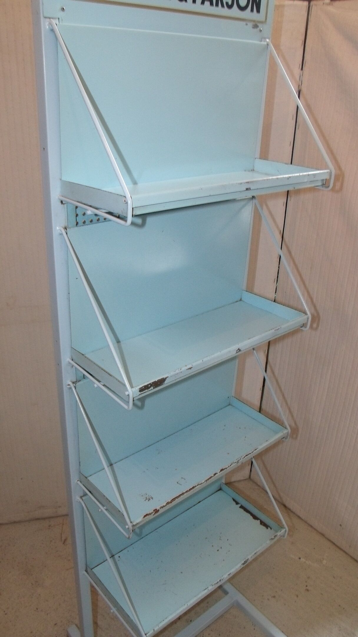 Rolling industrial metal display stand