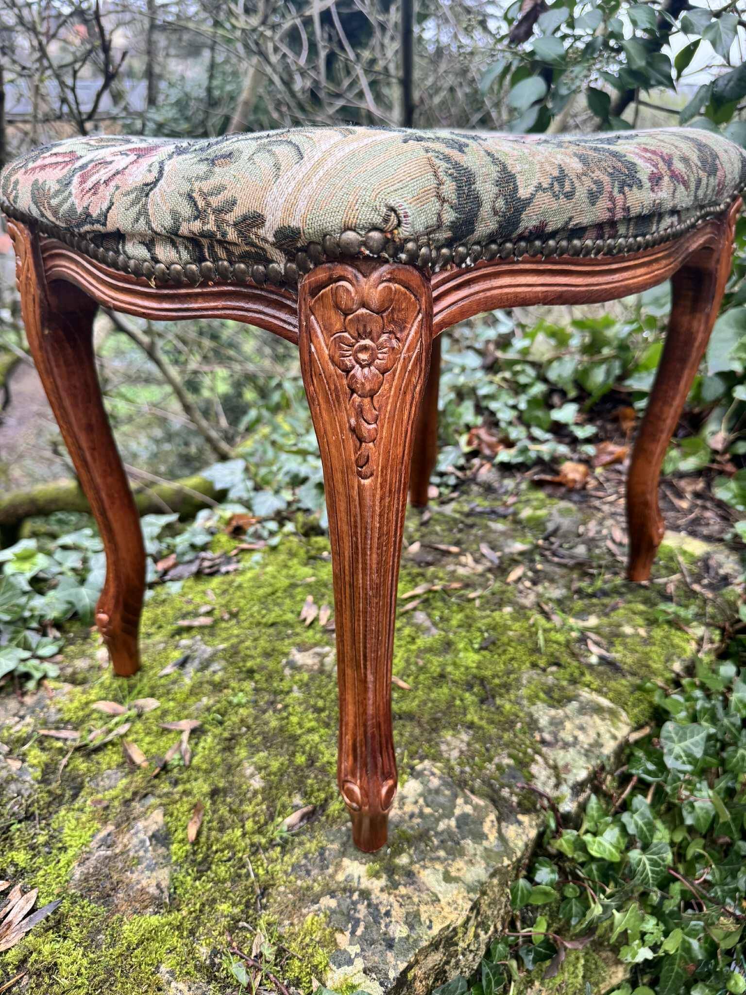 Large antique footrest in the Louis XV style.
