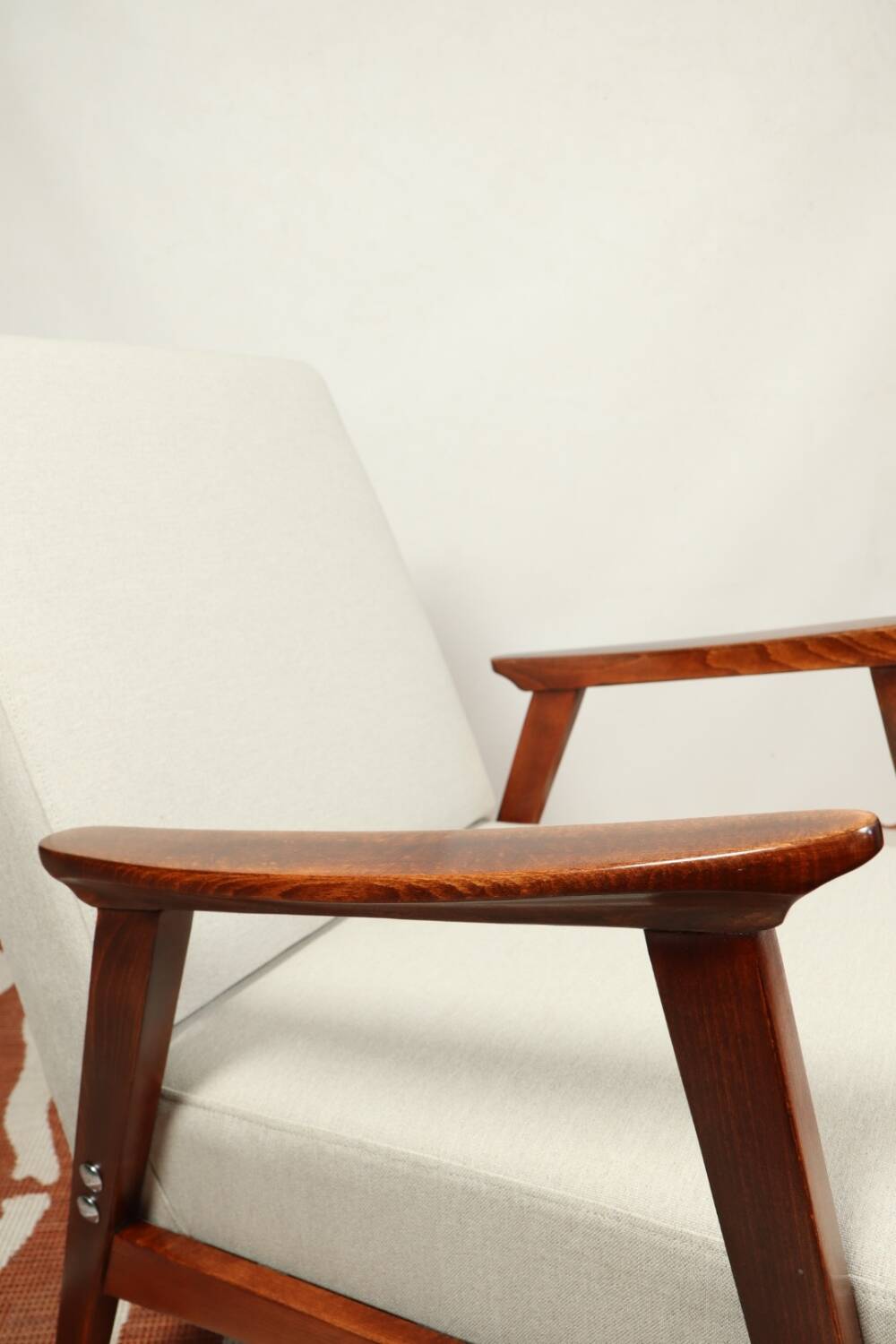Vintage light gray armchair dark wood Scandinavian design 1970