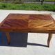 Antique solid walnut table with marquetry and extensions.