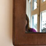 Early 20th century mirror in patinated leather  21x33,5cm