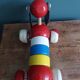 Lacquered wooden pull-along dog toy