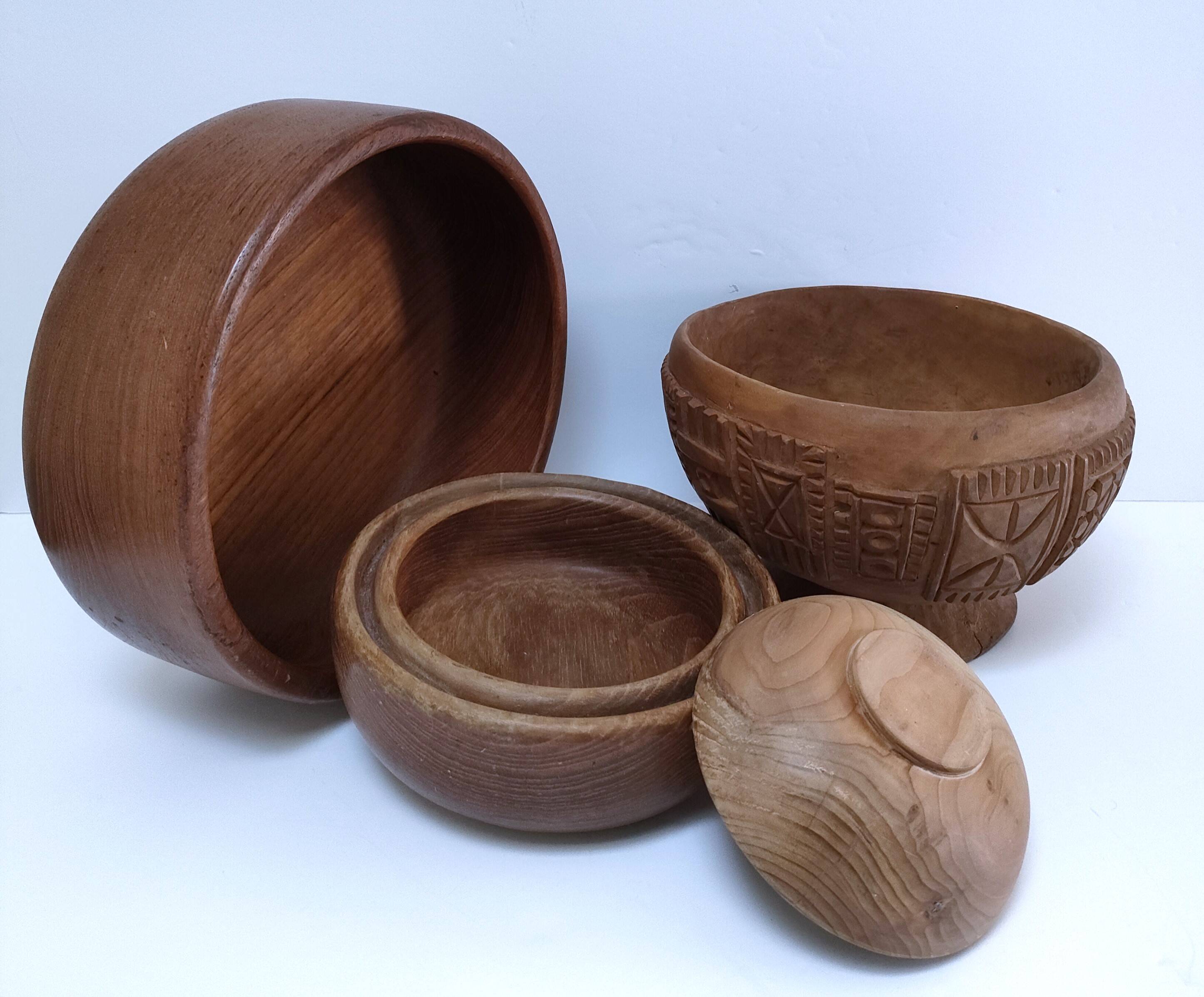 four vintage solid wood bowls