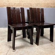 Brutalist and modernist dining chairs from the 1970s in architectural brown wood.
