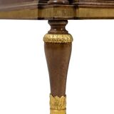 Empire style chest of drawers in lacquer, bronze and marble. Nineteenth century.