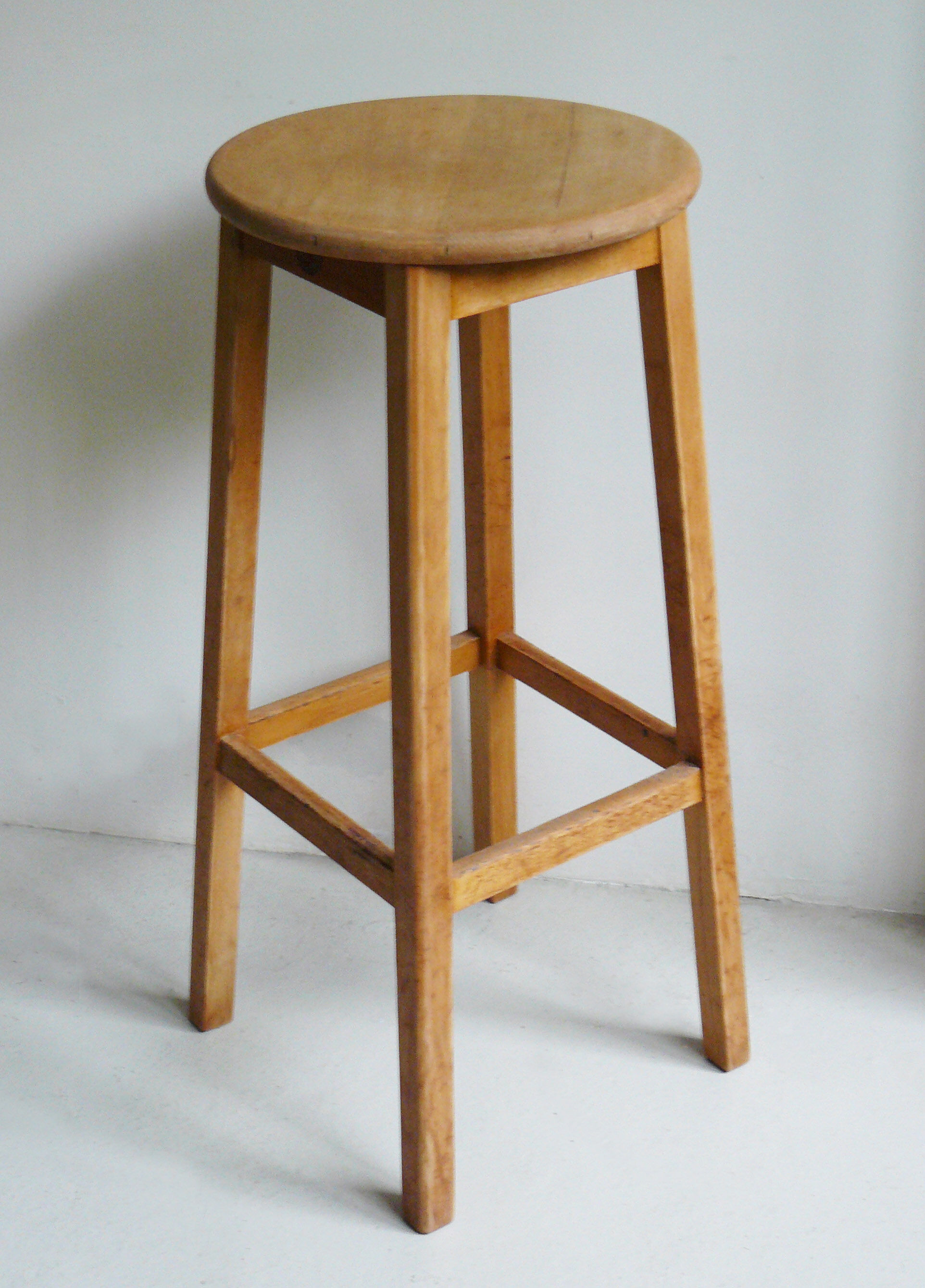 High wooden tabouret