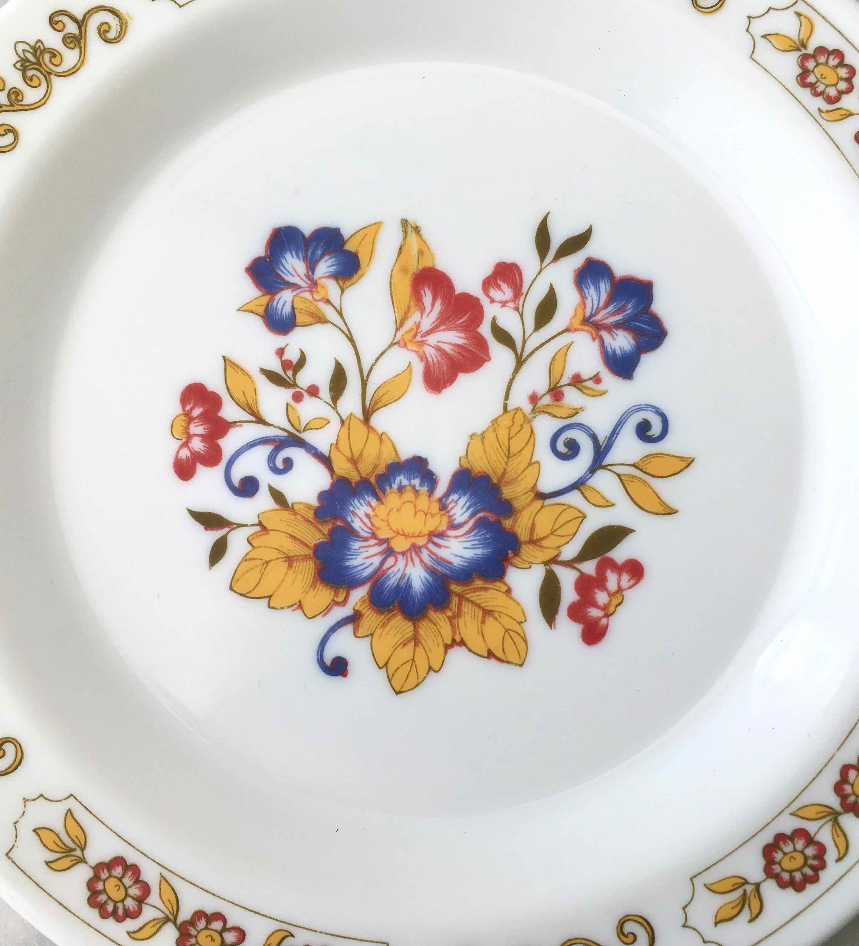 6 floral dessert plates 1970