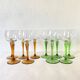Vintage stemmed glasses, green or amber stem