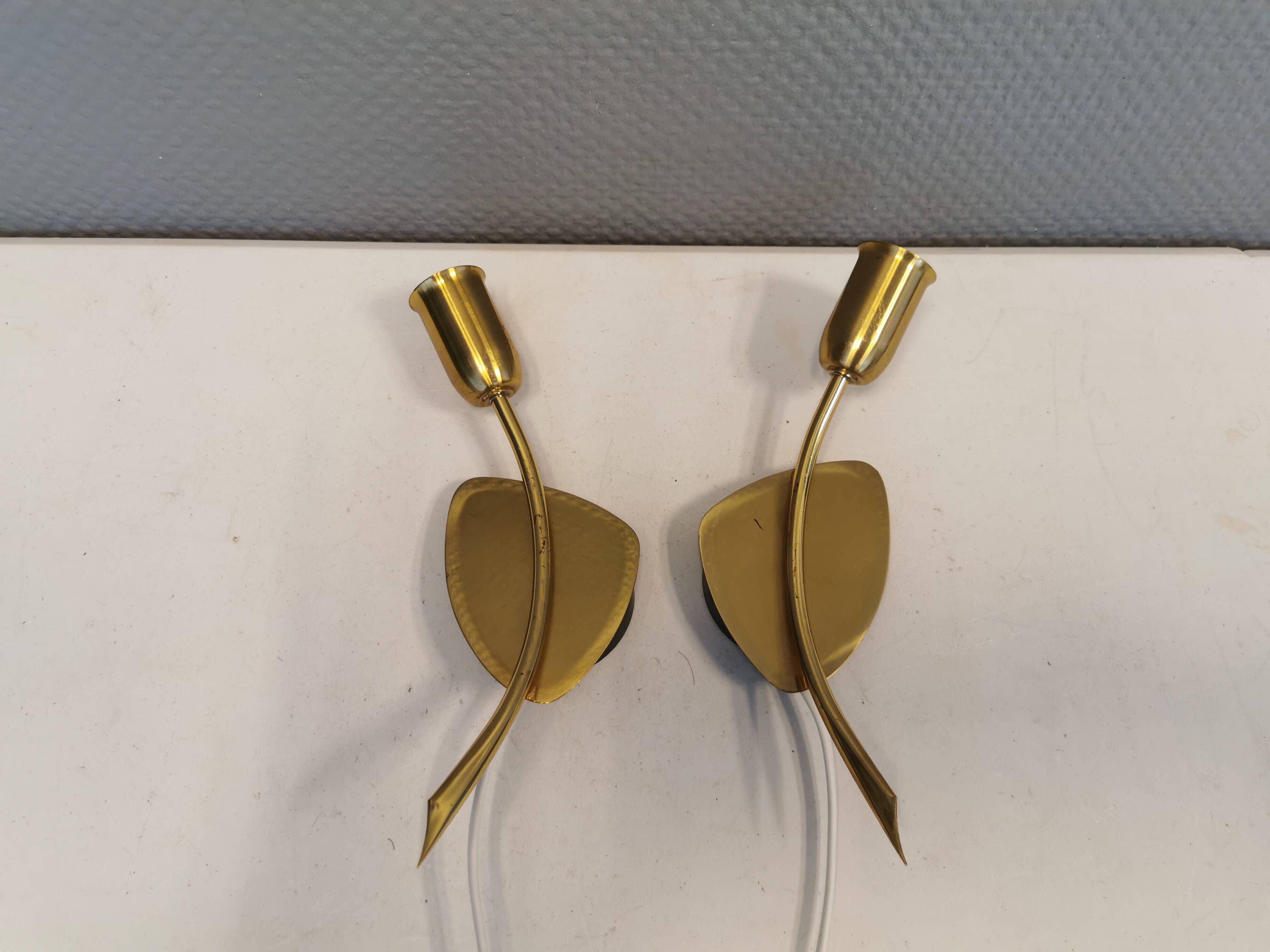 A set of "tulip" wall lamps in golden colored metal. Danish 1970-80s