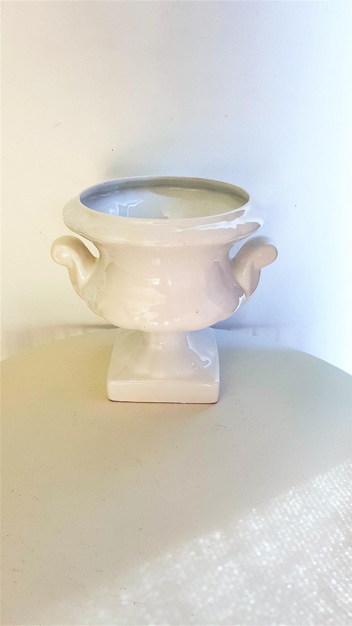 White ceramic medici-shaped planter