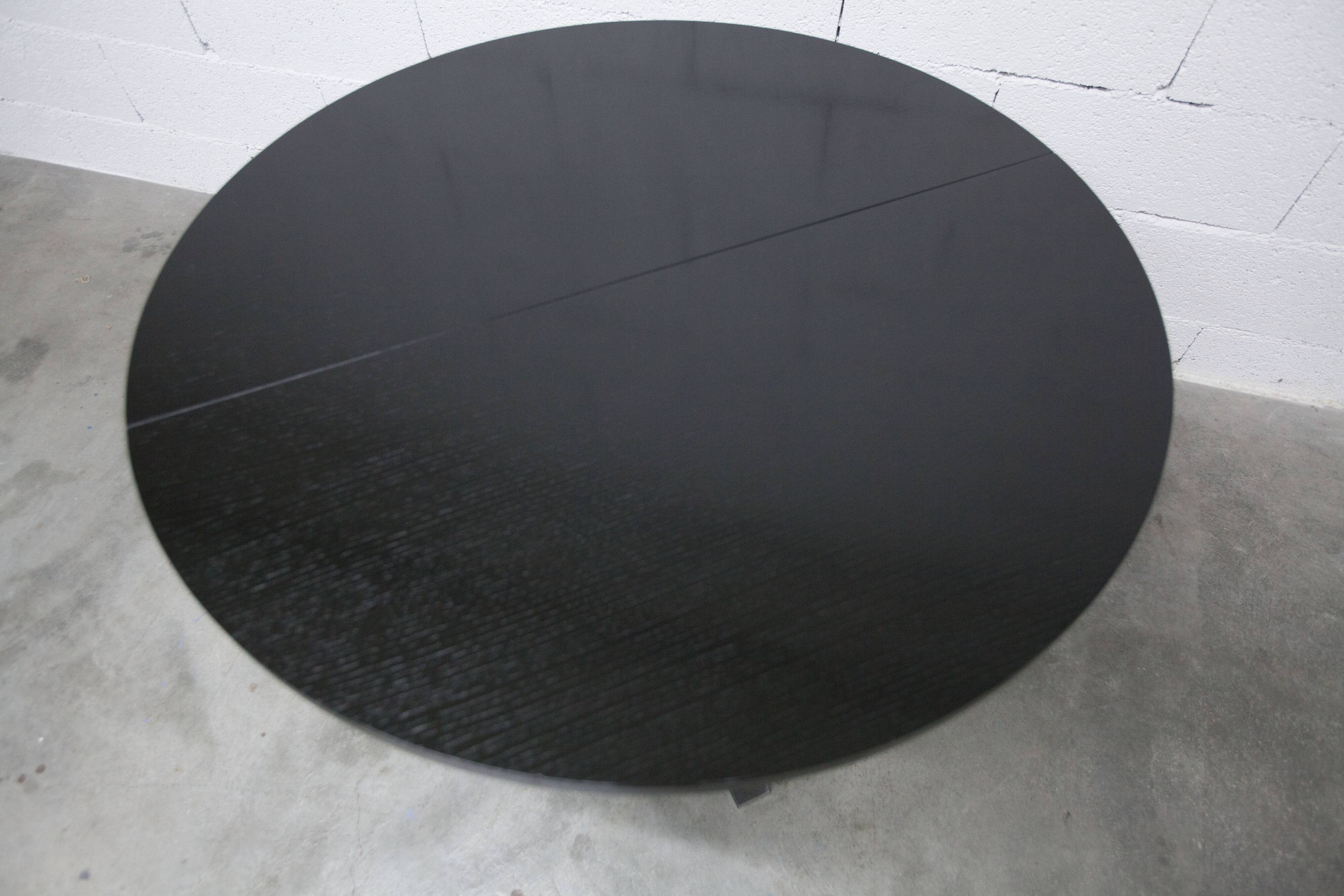 Round table rises and lowers Osvaldo Borsani black and chrome with extension