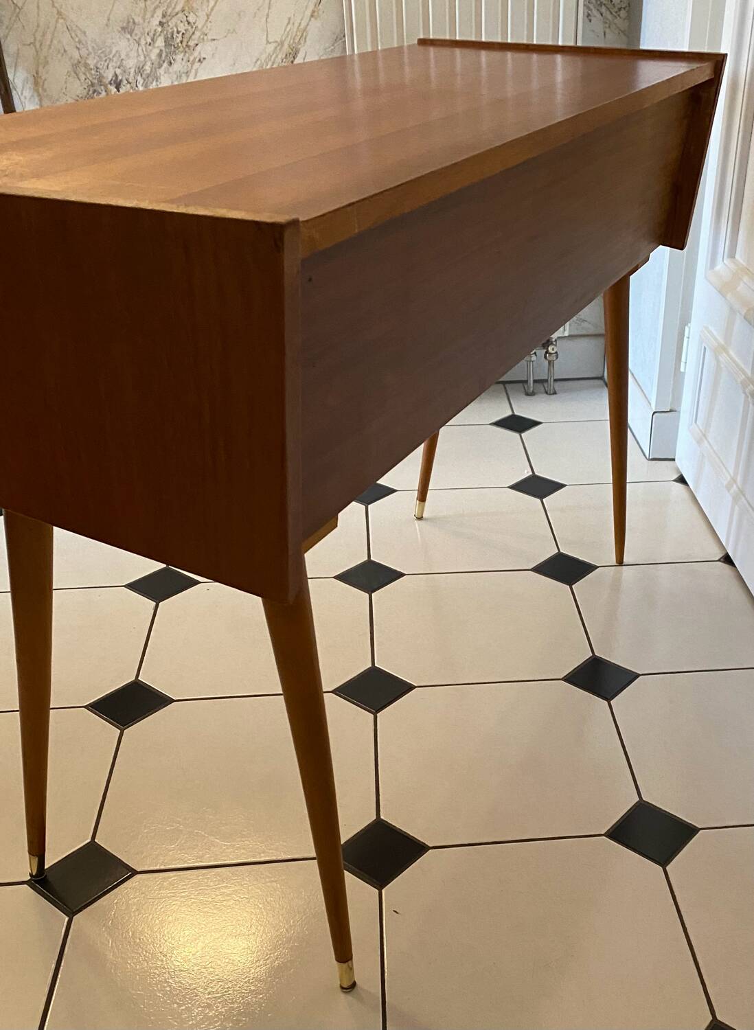 Vintage console with compass feet