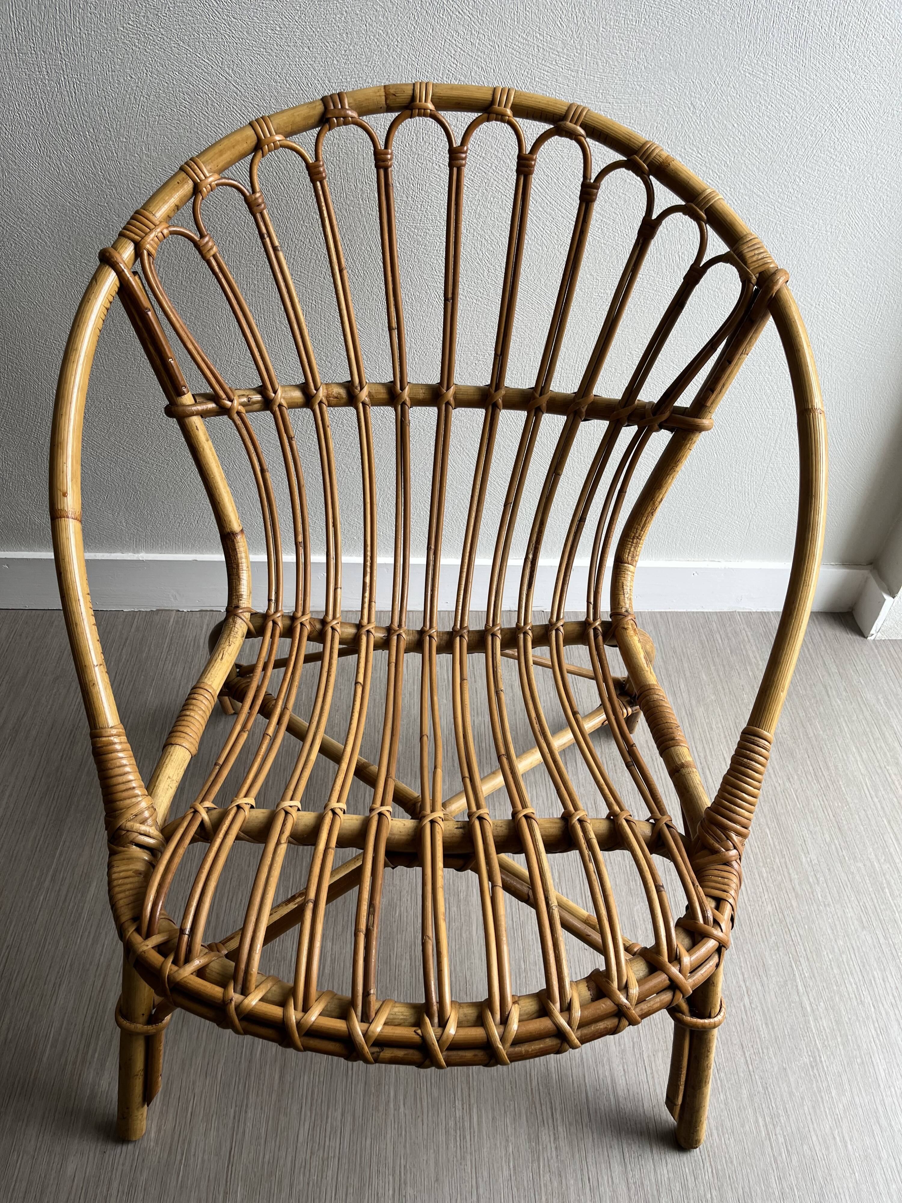 Vintage rattan shell armchairs