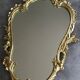 Miroir en bronze doré style rocaille 68 x 42 cm