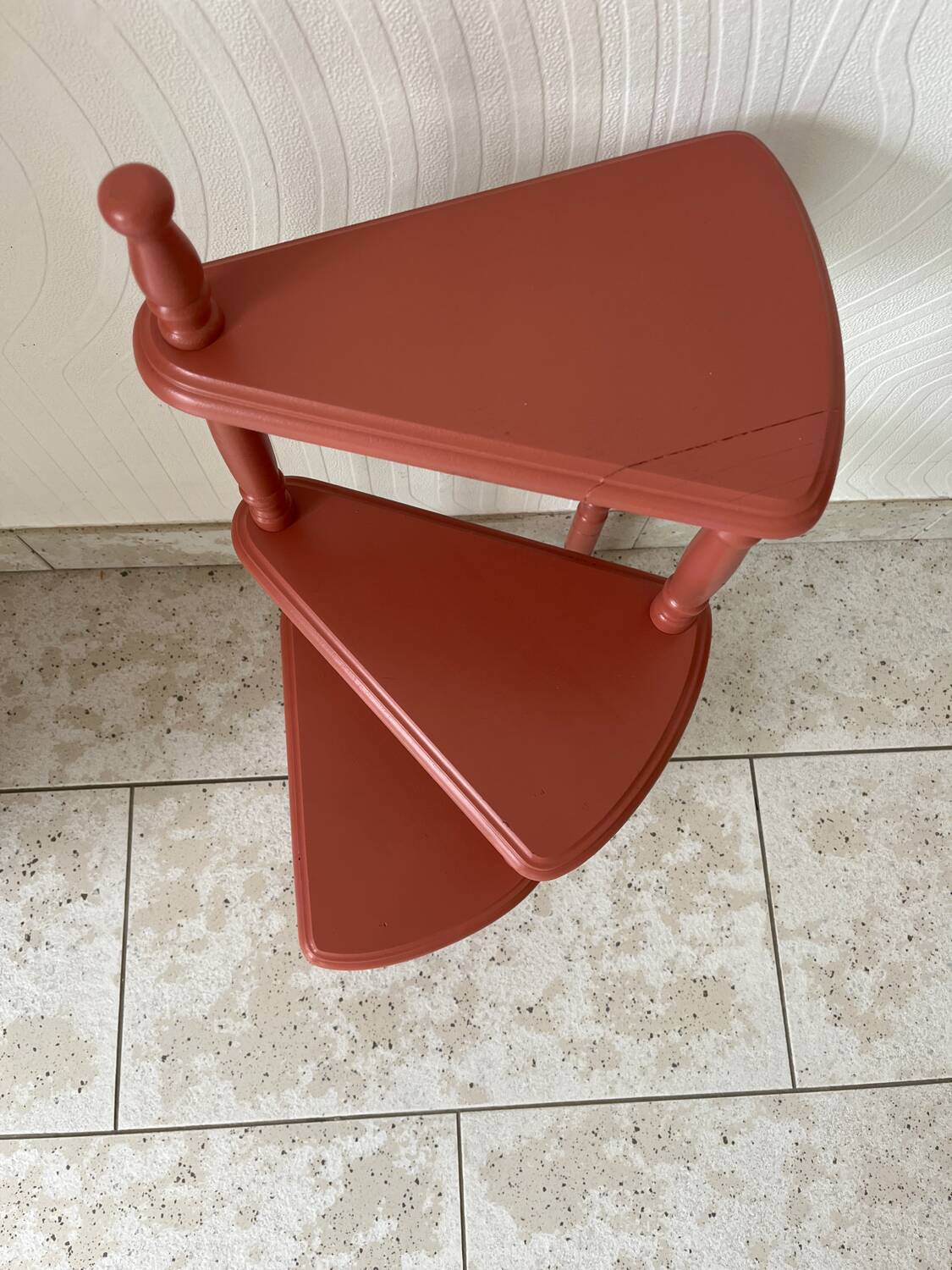 Old plant holder repainted in terracotta