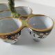 Antique egg holder by Jules Verlingue with polychrome floral decoration.