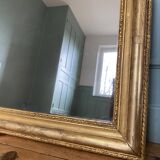 Louis-Philippe mirror gilded with gold leaf