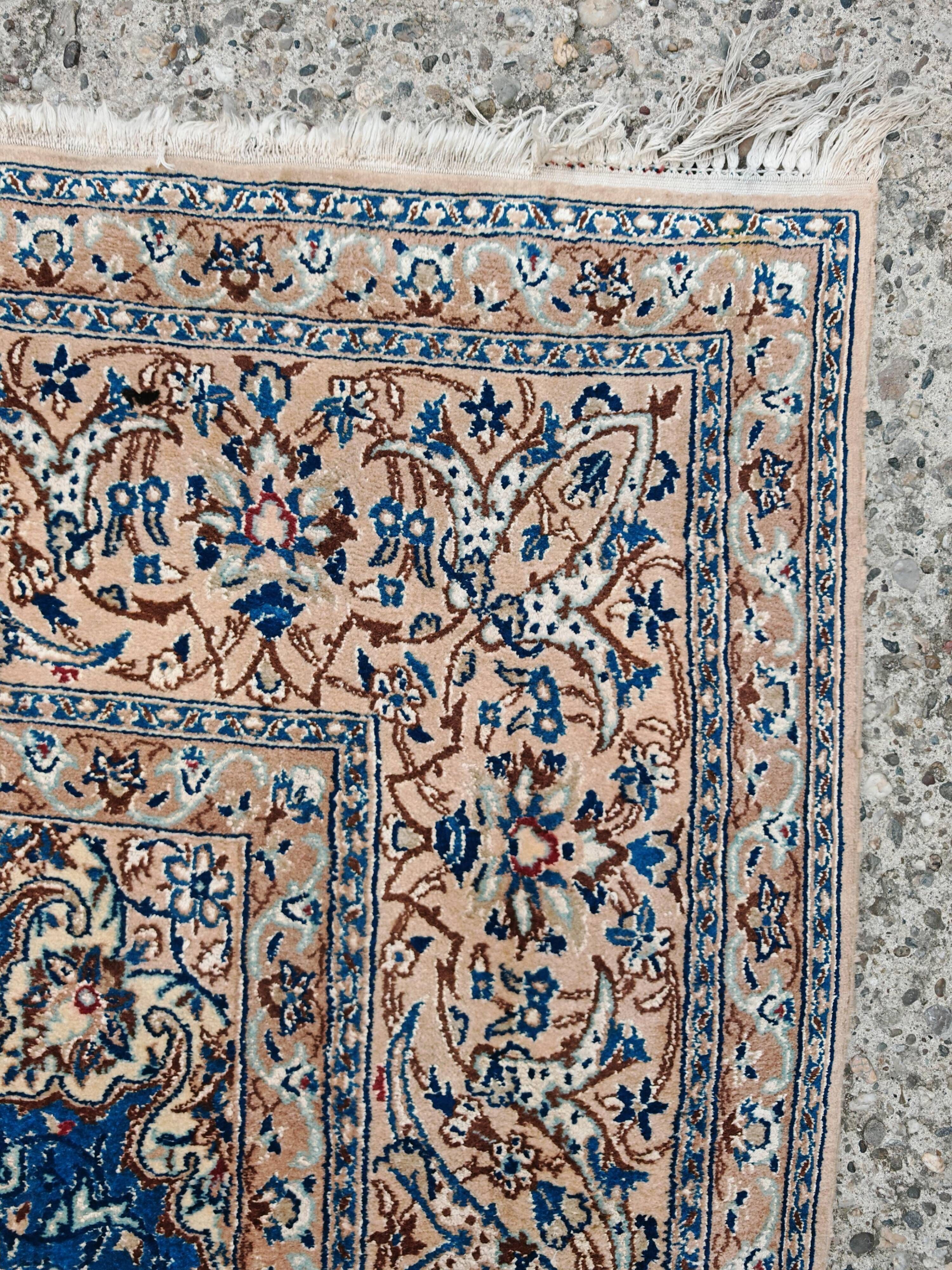 Vintage Persian Nain carpet, handwoven wool and silk from the 1940s.